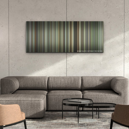 Oppenheimer color palette canvas on a concrete wall above a gray sectional sofa