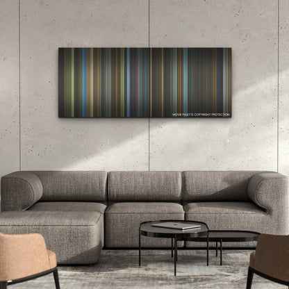 Snake Eyes color palette canvas on a concrete wall above a gray sectional sofa