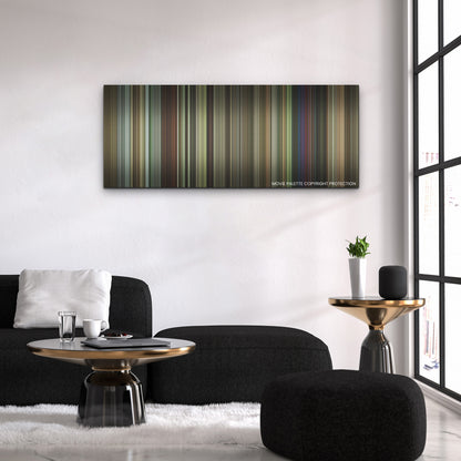 A Good Person color palette canvas above a black sofa with a gold-topped table