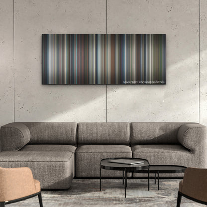 Perfect Days color palette canvas on a concrete wall above a gray sectional sofa
