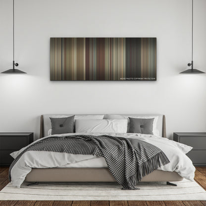 Maharaja color palette canvas above a bed, between two black pendant lamps