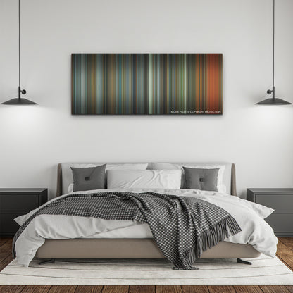 Samaritan color palette canvas above a bed, between two black pendant lamps