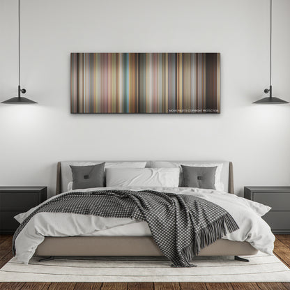 Do Revenge color palette canvas above a bed, between two black pendant lamps