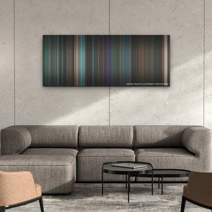 Venom: Let There Be Carnage color palette canvas on a concrete wall above a gray sectional sofa