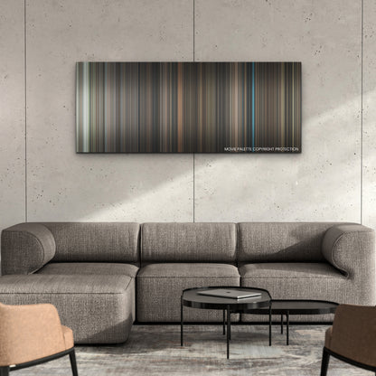 The Menu color palette canvas on a concrete wall above a gray sectional sofa