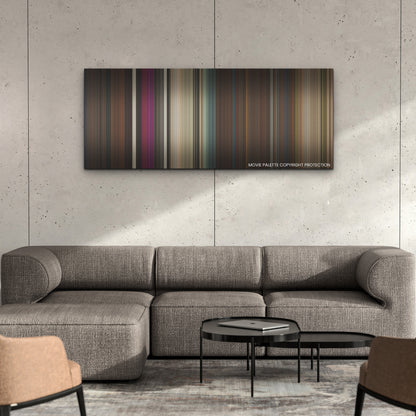 Gunpowder Milkshake color palette canvas on a concrete wall above a gray sectional sofa