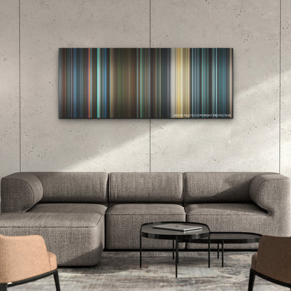 Heart of Stone color palette canvas on a concrete wall above a gray sectional sofa