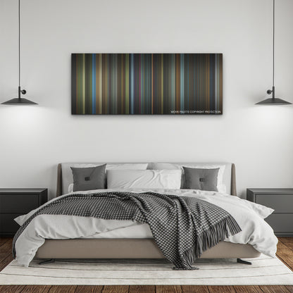 Snake Eyes color palette canvas above a bed, between two black pendant lamps