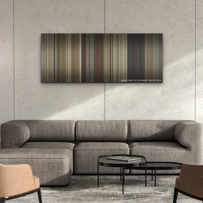 Maharaja color palette canvas on a concrete wall above a gray sectional sofa