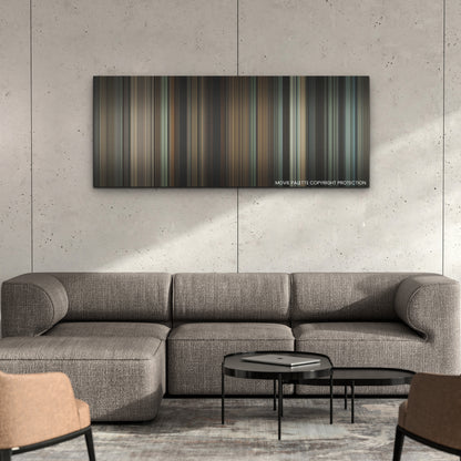 The Hunger Games: The Ballad of Songbirds & Snakes color palette canvas on a concrete wall above a gray sectional sofa