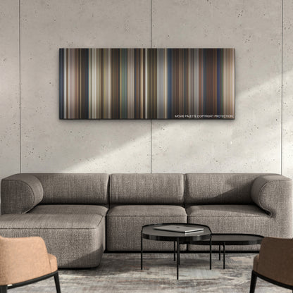 Monster Summer color palette canvas on a concrete wall above a gray sectional sofa