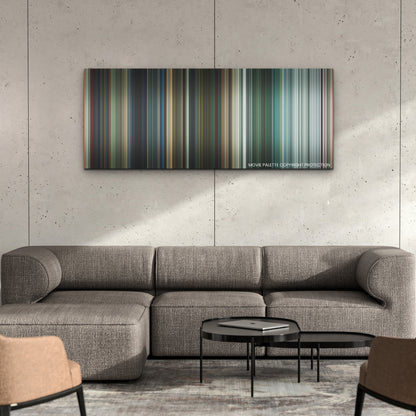 The Suicide Squad color palette canvas on a concrete wall above a gray sectional sofa