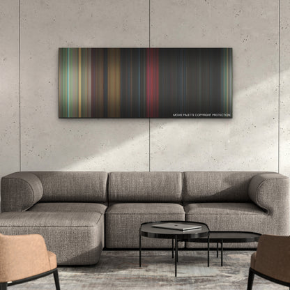 Bodies Bodies Bodies color palette canvas on a concrete wall above a gray sectional sofa