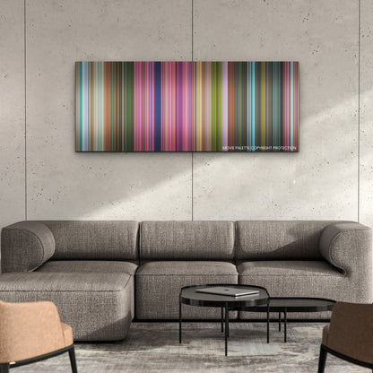 Strange World color palette canvas on a concrete wall above a gray sectional sofa