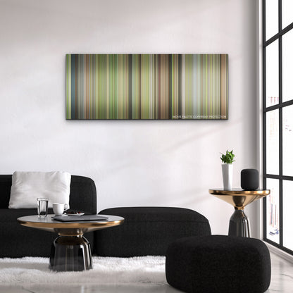 Next Goal Wins color palette canvas above a black sofa with a gold-topped table