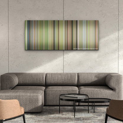 Next Goal Wins color palette canvas on a concrete wall above a gray sectional sofa
