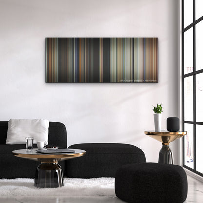 Bones and All color palette canvas above a black sofa with a gold-topped table