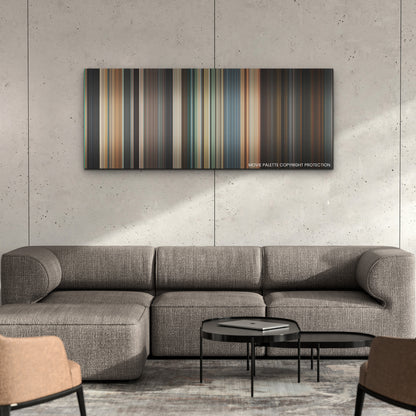 Day Shift color palette canvas on a concrete wall above a gray sectional sofa