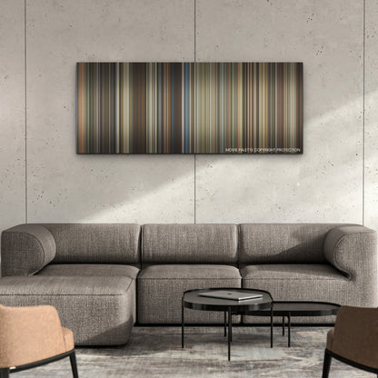 Rebel Moon - Part Two: The Scargiver color palette canvas on a concrete wall above a gray sectional sofa