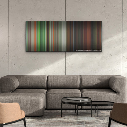 Men color palette canvas on a concrete wall above a gray sectional sofa