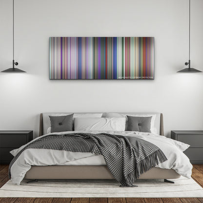 Spellbound color palette canvas above a bed, between two black pendant lamps