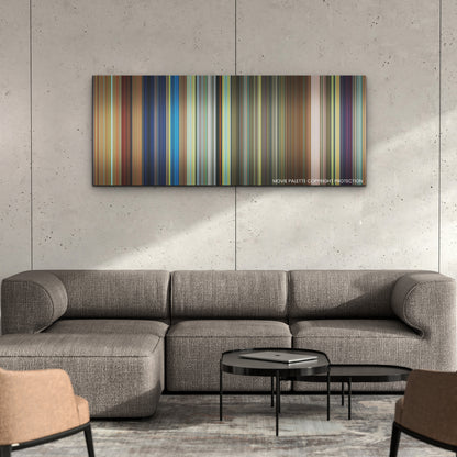 Chicken Run: Dawn of the Nugget color palette canvas on a concrete wall above a gray sectional sofa