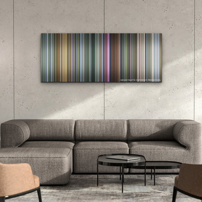 Godzilla x Kong: The New Empire color palette canvas on a concrete wall above a gray sectional sofa
