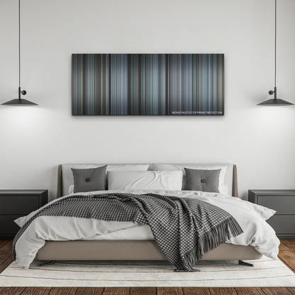 The Ice Road color palette canvas above a bed, between two black pendant lamps