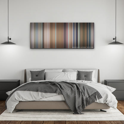 You People color palette canvas above a bed, between two black pendant lamps