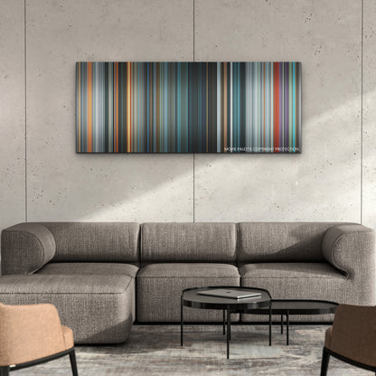 The Flash color palette canvas on a concrete wall above a gray sectional sofa