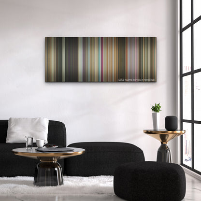 IF color palette canvas above a black sofa with a gold-topped table