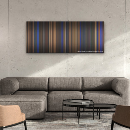 Guillermo del Toro's Pinocchio color palette canvas on a concrete wall above a gray sectional sofa