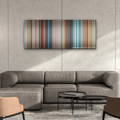 DC League of Super-Pets color palette canvas on a concrete wall above a gray sectional sofa