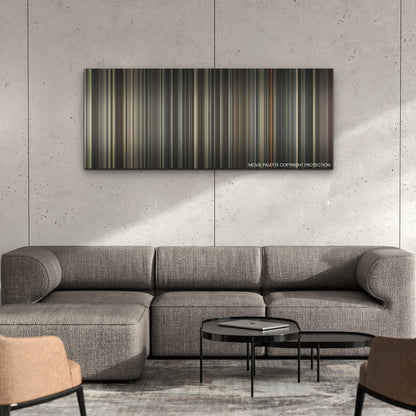 Killers of the Flower Moon color palette canvas on a concrete wall above a gray sectional sofa