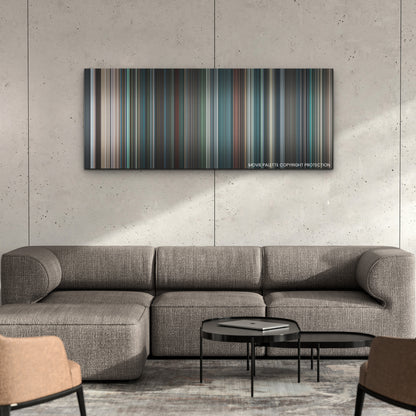 No Time to Die color palette canvas on a concrete wall above a gray sectional sofa