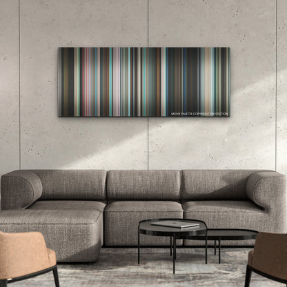 Aftersun color palette canvas on a concrete wall above a gray sectional sofa
