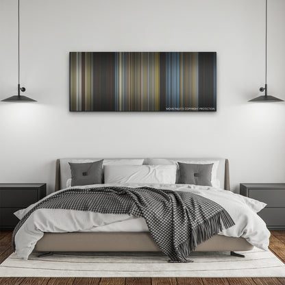 Prey color palette canvas above a bed, between two black pendant lamps