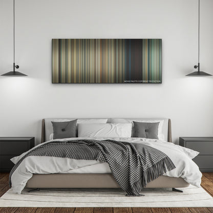 Old color palette canvas above a bed, between two black pendant lamps