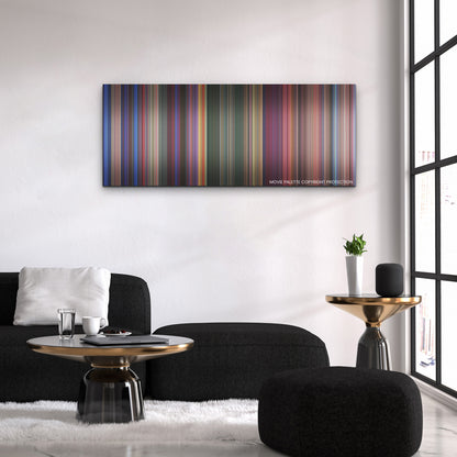 Transformers One color palette canvas above a black sofa with a gold-topped table
