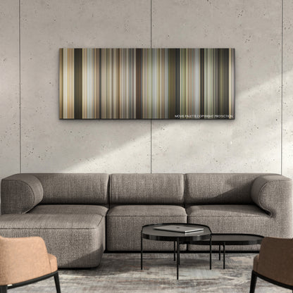 The Marksman color palette canvas on a concrete wall above a gray sectional sofa