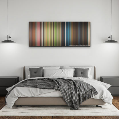 The Lost City color palette canvas above a bed, between two black pendant lamps