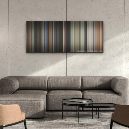 Bones and All color palette canvas on a concrete wall above a gray sectional sofa