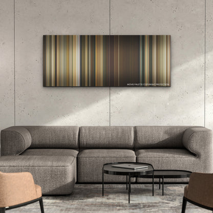 Don't Worry Darling color palette canvas on a concrete wall above a gray sectional sofa