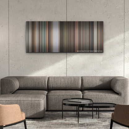 Dream Scenario color palette canvas on a concrete wall above a gray sectional sofa