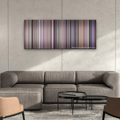 The Substance color palette canvas on a concrete wall above a gray sectional sofa
