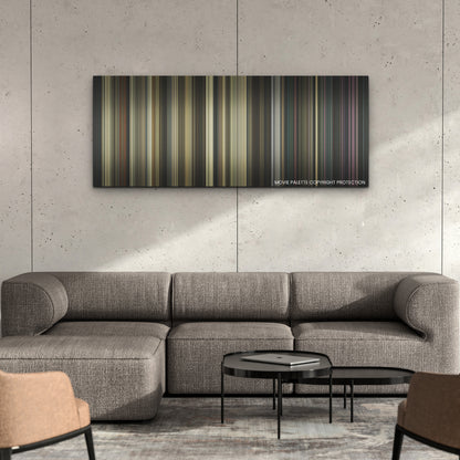 Ghostbusters: Afterlife color palette canvas on a concrete wall above a gray sectional sofa