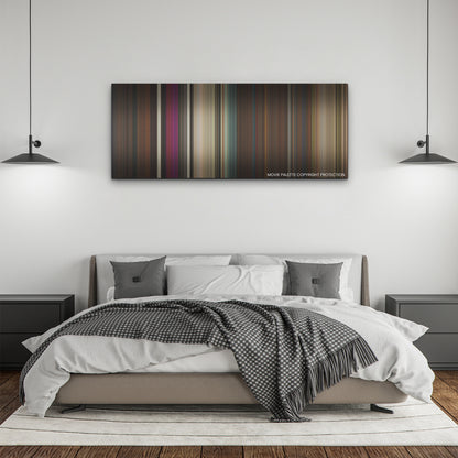 Gunpowder Milkshake color palette canvas above a bed, between two black pendant lamps