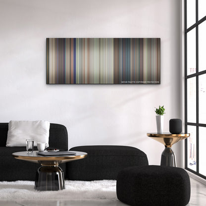 Ricky Stanicky color palette canvas above a black sofa with a gold-topped table