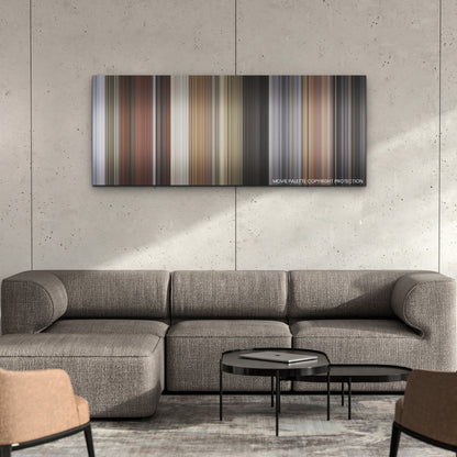 Deadpool & Wolverine color palette canvas on a concrete wall above a gray sectional sofa