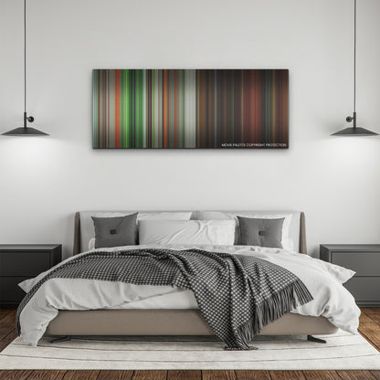 Men color palette canvas above a bed, between two black pendant lamps